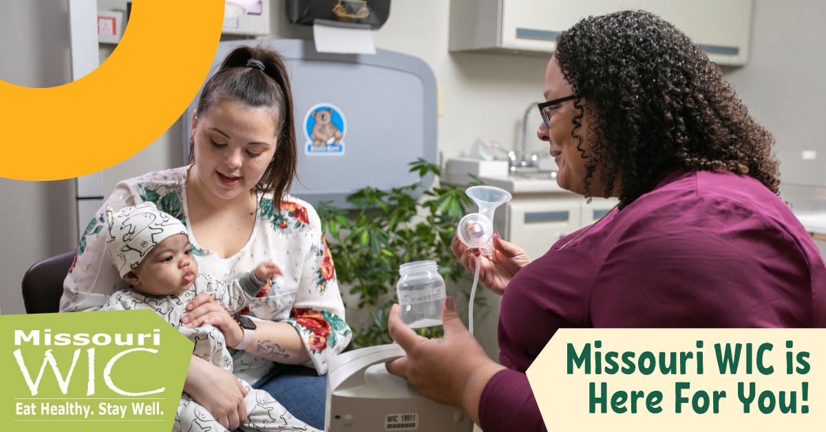 Mom holding baby at WIC appointment